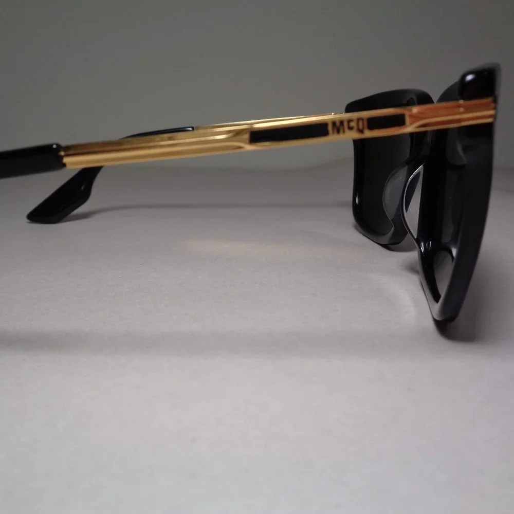 McQ by Alexander McQueen MQ0055S Black Gold New Men's Sunglasses